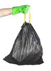 Hand in glove holding handles of black disposable garbage bag, trash sack full of rubbish isolated...