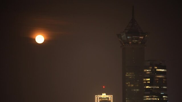 The full moon, which is rarely seen over the night city of Baku