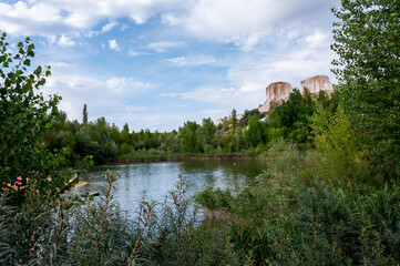 Fototapeta na wymiar Summer landscape: a lake in a former pit called the White Well near the city of Voronezh