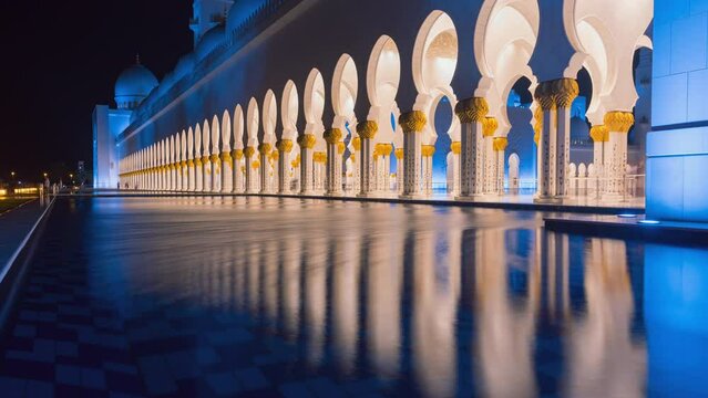 4K Time lapse of Sheikh Zayed Grand mosque reflect by water.