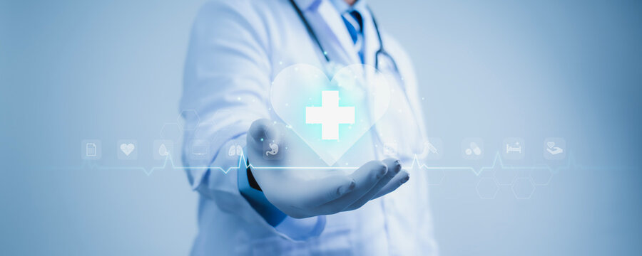 Doctor hold white cross of medical with healthcare icons on virtual interface network. Virus pandemic develop people awareness healthcare, Science, Medical technology and health care service