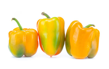 Few ripe bulgarian peppers isolated on white background