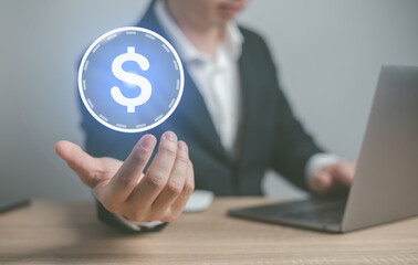 Man hand holding dollar sign.