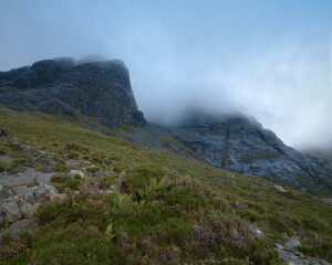 Morning view of cloud covered mountain range. Bla Bheinn, Isle of Skye, Scottish Highlands, UK.