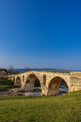 Obraz na płótnie Canvas Pont Julien, roman stone arch bridge over Calavon river, Provence, France