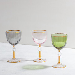 Concept with colored glass goblets