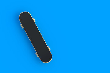 Skateboard on blue background. Hobbie and leisure. Sports equipment. Top view. Copy space. 3d render