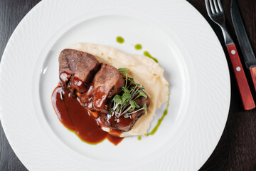Meat with mashed potatoes. Concept of restaurant serving dishes.