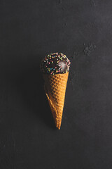 Ice cream cone with colorful sprinkles