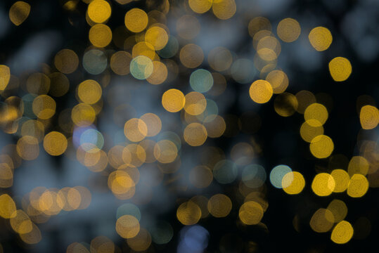 bright bubbles of yellow lights, abstract background, bokeh blur effect
