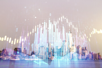 Fototapeta na wymiar Multi exposure of virtual abstract financial graph interface on Manhattan cityscape background, financial and trading concept