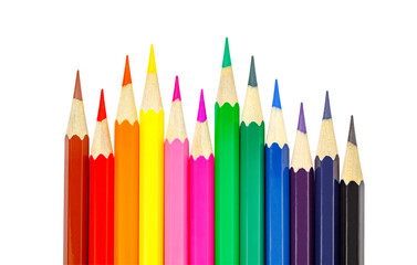 Colored pencils different lengths, lying side by side, close-up, isolated on white background with clipping path