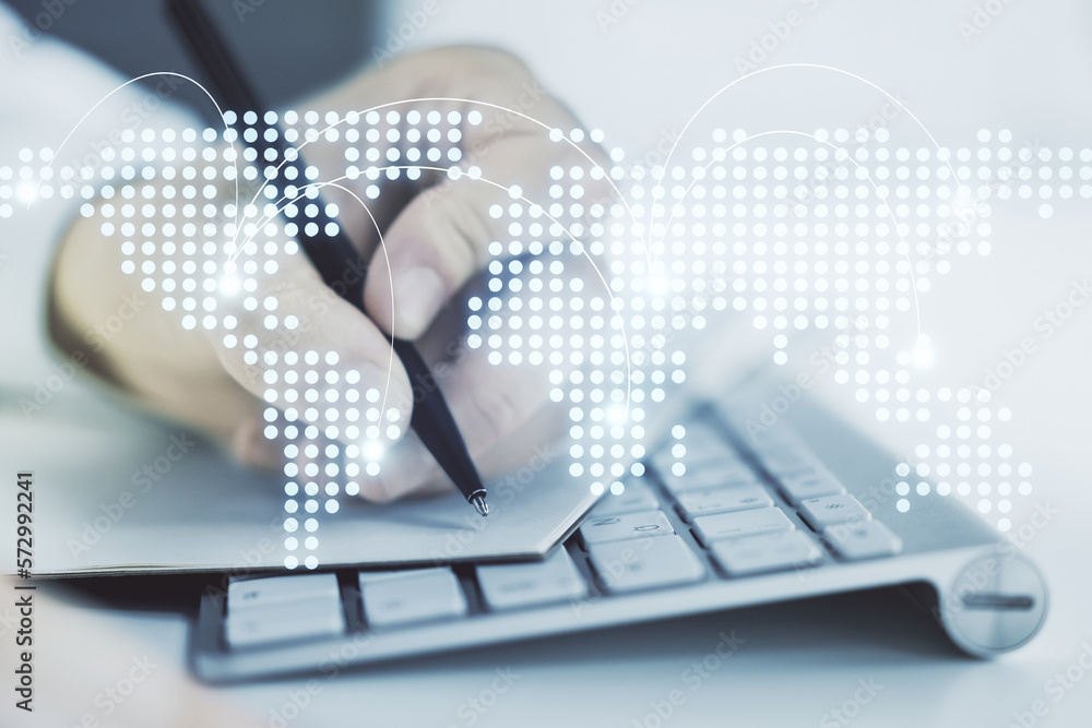 Poster abstract creative world map with connections and hand writing in notebook on background with laptop,