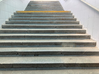Close up view of design of old stone staircase going up. steps close to going up