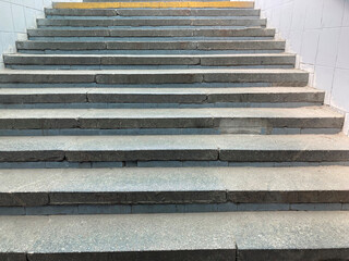 Close up view of design of old stone staircase going up. steps close to going up