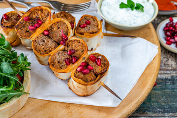 Beyti - Turikish lamb kofte-style kebab wrapped in flatbread