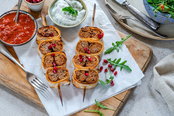 Beyti - Turikish lamb kofte-style kebab wrapped in flatbread