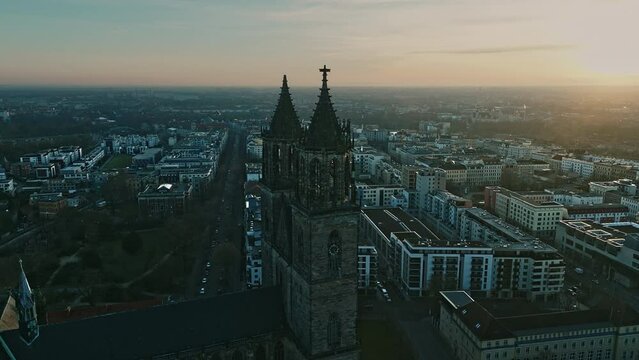 Drone shot of Magdeburg Cathedral (Dom zu Magdeburg) at sunset , Magdeburg, Saxony-Anhalt, Germany,