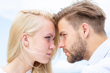 Sexy couple in love. Sensual man embraces beauty woman. Tenderness and affection. Sexy lovely couple in the tender passion. Studio portrait of young couple. Beautiful sensual woman and sexy man.