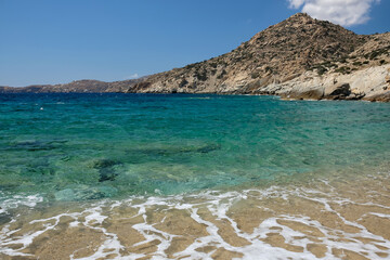 The beautiful turquoise dream sandy beach of Sapounohoma in Ios Greece