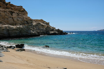 The beautiful turquoise sandy beach of Sapounohoma in Ios Greece