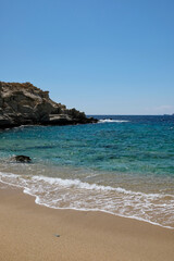 The beautiful turquoise sandy beach of Sapounohoma in Ios Greece
