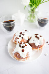 Donuts and black coffee on a white background. breakfast