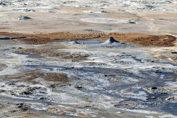 Hverir geothermal area in Iceland. Popular tourist area with mud pots and smoking vents.