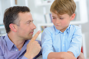 a father is upset with his son