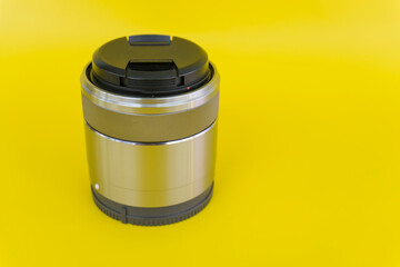 35mm macro fix lens isolated on yellow background
