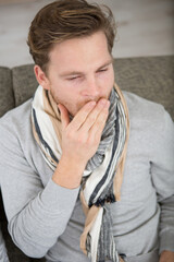 Obraz premium yawning tired man at home or office