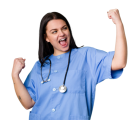 Young nurse woman isolated raising fist after a victory, winner concept.