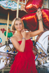 woman in a dress on a carousel