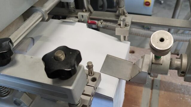 Automatic box folder gluer machine for box or carton packaging.  Printing and paper industry.

