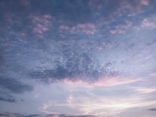 Sky with pink and blue clouds at the sunset - 573015064