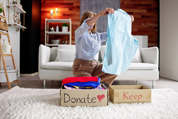 Fototapeta na wymiar Donating Decluttering And Cleaning Up Wardrobe
