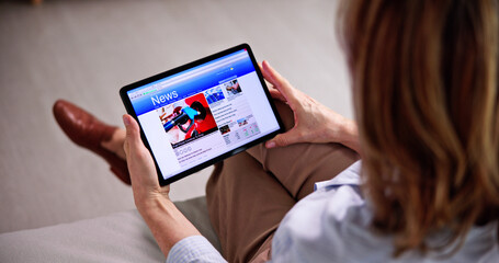 Reading News Website Or Electronic Newspaper