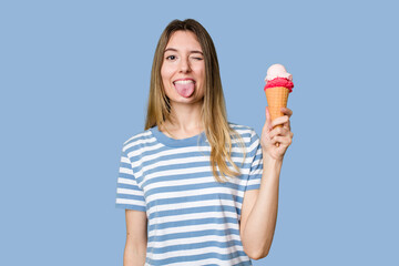 Young woman eating an ice cream isolated