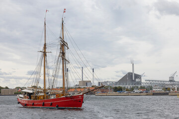 Old sailing boat in Copenhagen with tourists on board for sightseeing,Denmark,Europe