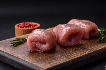 Delicious chicken or pork meat roll with mushrooms, cheese, spices and herbs