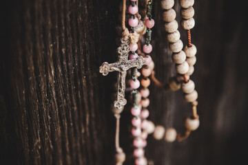 Holy Cross with the crucified Jesus Christ. Very ancient statue. Horizontal image.