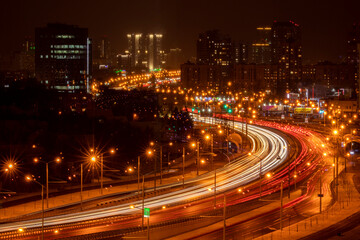 Fototapeta na wymiar Traffic, view from above. Basarab Bridge landmark, photo during the night.