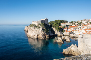 Fototapeta na wymiar Wonderful town of Dubrovnik, built on the steep slopes with famous fortified city walls and world heritage sites
