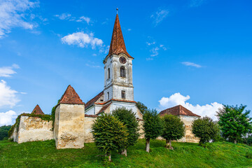 Traditional fortified church in Gherdeal village, Sibiu county, Transylvania, Romania; medieval saxon fortified church - obrazy, fototapety, plakaty
