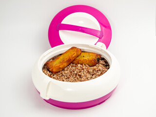 Thermos for food on a light background. Close-up