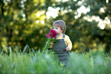 little boy with flowers