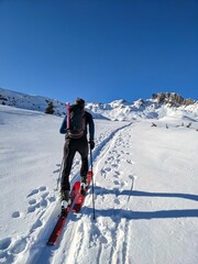 Beautiful ski touring slope in a fantastic mountain world. Ski mountaineering in the swiss alps....