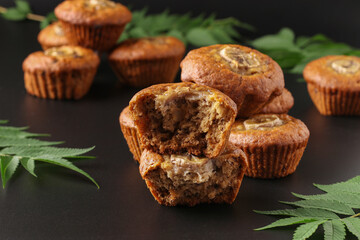 Homemade banana muffins with cinnamon on dark background, Closeup