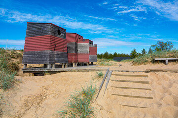 Bathing hut and sandy beach