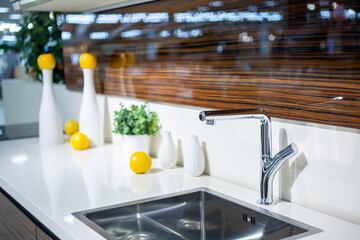 Kitchen interior with sink and white items